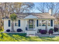 Charming one story home with a brick facade, green lawn, and manicured landscaping at 1415 Mt Gallant Rd, Rock Hill, SC 29732