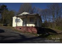 Modest single-Gathering home featuring an inviting front porch at 142 Fletcher Sw Ct, Concord, NC 28027