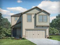 Charming two-story home with neutral siding, inviting curb appeal, and attached two car garage at 2102 Morgan Hills Dr, Albemarle, NC 28001