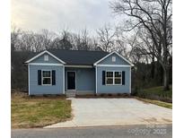 Charming single-story home with blue siding and black shutters at 917 Moose St, Gastonia, NC 28056