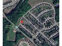 Aerial view of a neighborhood featuring well-maintained homes and landscaping, conveniently located near Twelve Mile Creek Greenway at 3500 Exbury Gardens Dr, Waxhaw, NC 28173