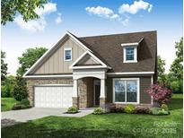 Charming single-Gathering home featuring a two-car garage and craftsman style details at 4009 Grace Pointe Dr # 101, Indian Trail, NC 28079