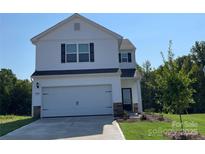 Charming two-story home with a two-car garage and classic black shutters at 1522 Doran Ter, Richburg, SC 29729