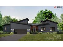 Stunning single-story modern home with sleek gray siding, a two-car garage, and a covered front entry at 1935 Weddington Rd # 1, Matthews, NC 28104