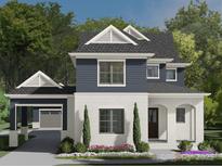 Charming two-story home featuring white brick, navy siding, and a welcoming covered porch at 19104 Newburg Hill Rd, Davidson, NC 28036