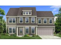 Charming two-story home featuring a well-maintained lawn and a welcoming front porch with columns at 261 Supernova Dr, York, SC 29745