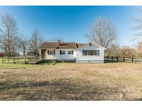 Charming single-story home with a well-maintained lawn and classic architectural details at 3467 Clearview Ln, Maiden, NC 28650