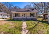 Charming single-story home featuring a cozy front porch and classic design at 208 Columbia Ave, Rock Hill, SC 29730