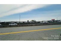 Commercial street with traffic at 3000 Dalecrest Dr, Charlotte, NC 28269