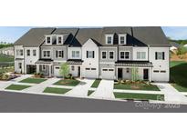 Charming new townhouse exteriors with black accents, light-colored facades, and neatly manicured landscaping at 3063 Finchborough Ct # 216, Charlotte, NC 28269