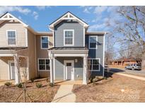 Charming two-story home features modern design, neat landscaping and a welcoming entrance at 336 F Lincoln St, Concord, NC 28025