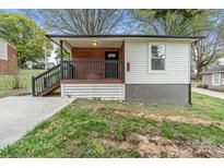 Charming single-story home with a cozy front porch, fresh paint, and black trim at 902 Grace St, Kings Mountain, NC 28086