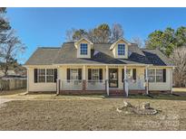 Charming one-story home with a welcoming front porch and dormer windows at 1852 Bon Rea Dr, Rock Hill, SC 29730