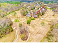 Beautiful aerial view of house with golf course #5 & #6 in the background and surrounding community at 1316 Valhalla Dr, Denver, NC 28037