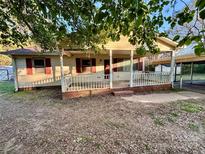 Charming one-story home with a cozy front porch and red shutters at 4834 Barrett Rd, Kings Mountain, NC 28086