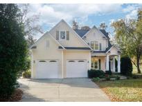 Charming two-story home with a two-car garage and manicured landscaping in a well-maintained community at 124 Gatlin Knl # 11, New London, NC 28127