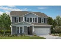 Charming two-story home with gray siding, stone accents, and a two-car garage at 117 Goorawing Ln, Mooresville, NC 28115