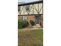 Charming townhouse featuring a classic brick facade and decorative trim at 11011 Park Rd, Charlotte, NC 28226