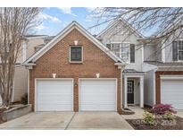 Charming two-story home with a two-car garage and well-maintained landscaping at 10015 Garrison Watch Ave # 168, Charlotte, NC 28277
