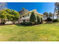 Charming two-story home with landscaped yard and inviting curb appeal at 22 Honeysuckle Ln, Clover, SC 29710