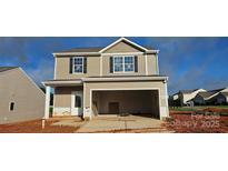 Two story home featuring an attached garage and windows with black shutters at 507 Maddox Dr, Shelby, NC 28152