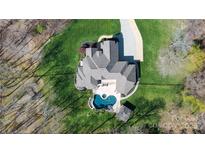 Aerial view featuring the luxurious property showcasing a large lot, a spacious house, swimming pool and meticulous landscaping at 2017 Colorado Ct, Lancaster, SC 29720