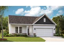 Charming single-story home featuring a stone-accented facade, a two-car garage, and a well-manicured lawn at 1026 Mapletree Ln, Indian Trail, NC 28079