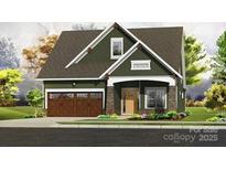 Charming craftsman-style home boasts a two-car garage, inviting front porch, and meticulously landscaped front yard at 182 Fulworth Nw Dr # 63, Concord, NC 28027