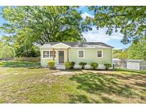 Charming single story home featuring a well-kept lawn and inviting front entrance at 1905 Wood St, Gastonia, NC 28052