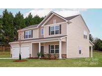 Charming two-story home featuring beige siding, dark shutters, and a welcoming front porch at 5703 Skinny Dr, Charlotte, NC 28215