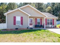Charming one story home with red shutters and well-maintained lawn at 2401 Gelsinger Ave, Bessemer City, NC 28016