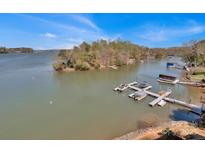 Aerial view featuring docks and boat slips at 9808 Emerald Point Dr # 10, Charlotte, NC 28278
