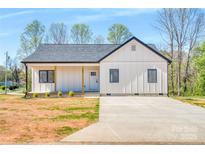 Charming new construction with a modern exterior and well-manicured lawn at 3600 Main Nw Ave, Hickory, NC 28601