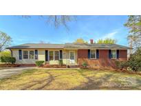 Charming single-story home featuring brick and siding with well-maintained landscaping at 2020 Parkdale Ave, Gastonia, NC 28052