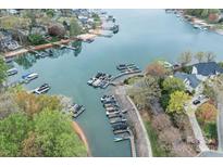 Aerial view of the community featuring lake access and private boat docks at 21721 Shoveller Ct, Cornelius, NC 28031