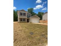 Inviting two-story home with a two-car garage and well-maintained lawn at 438 Phifer Rd, Kings Mountain, NC 28086