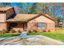 Charming brick home with a well-maintained lawn and inviting curb appeal at 106 Jason Ct, Fort Mill, SC 29715