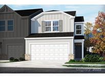 Charming two-story home with white garage door and front yard landscaping at 1713 Braemar Village Dr, Monroe, NC 28110