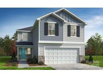Charming two-story home featuring a stone foundation, a light blue door, a two car garage, and a manicured lawn at 142 Bellina Dr # 58, York, SC 29745