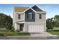 Charming two-story home featuring a two-car garage, gray siding, and a blend of modern design elements at 135 Wheeler Trl, Statesville, NC 28625