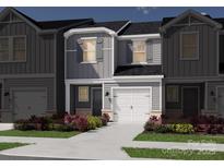 Charming townhome with gray siding, white trim, and a well-manicured front yard at 4333 Summit Woods Dr, Charlotte, NC 28216