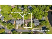 Aerial view showing property lines and surrounding neighborhood at 19113 Southport Dr, Cornelius, NC 28031