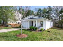 Charming single story home with a manicured lawn and covered entryway at 3944 Hemingway Nw Dr, Hickory, NC 28601