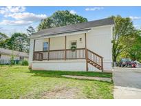 Charming single-story home with a cozy front porch and well-maintained lawn at 1901 Parkdale Ave, Gastonia, NC 28052