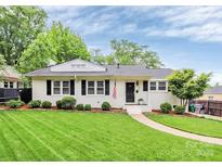 Charming single-story home with a well-manicured lawn and inviting curb appeal at 3510 Conway Ave, Charlotte, NC 28209