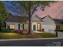 Charming single-story home with a well-maintained lawn and attached garage, perfect for easy living at 11705 Silverado Ln, Charlotte, NC 28277