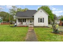 Charming home featuring a cozy front porch and inviting landscaping at 745 6Th Sw Ave, Hickory, NC 28602