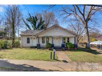 Charming single-story home with a covered front porch, offering curb appeal and outdoor enjoyment at 21 W D St, Newton, NC 28658