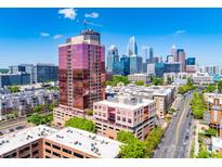Stunning aerial view of downtown Charlotte, showcasing the city skyline and modern architecture on a sunny day at 315 Arlington Ave # 506 & 507, Charlotte, NC 28203