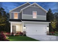 Charming two-story home with a two-car garage and beautifully landscaped front yard at 3013 Summit Oaks Rd, Charlotte, NC 28269